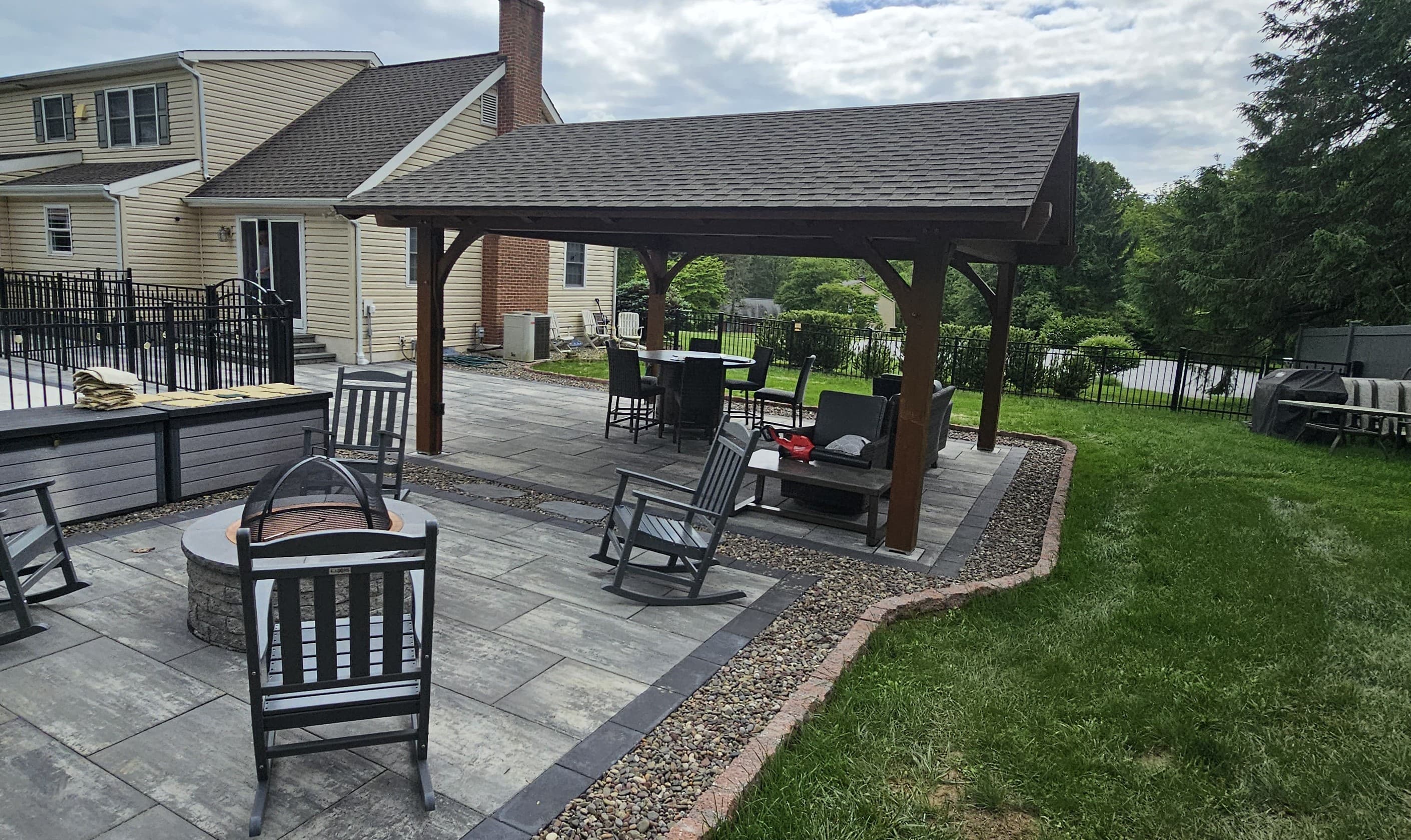 beautiful outdoor living space with fire pit and seating space